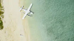 Coco Bahama Seaplane Arrival at Kamalame Cay Private Island Resort, Bahamas.