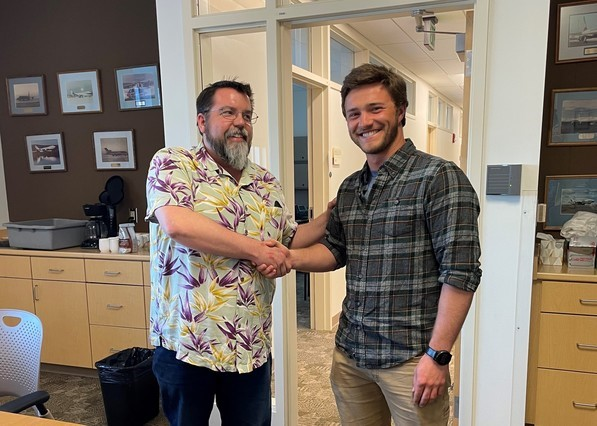 Photo (Left to Right): AOC President, Kevin Alexander, presents Brian Grams with the 2022 scholarship.