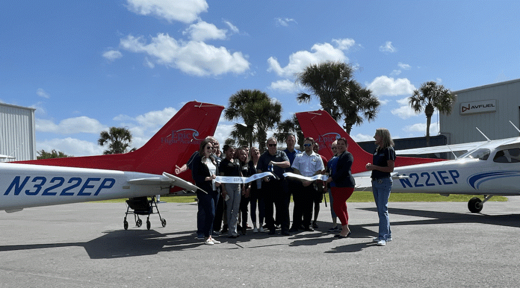 Members of the Ocala Metro Chamber and Economic Partnership joined Epic Flight Academy staff to cut the ribbon on the new flight training facility.