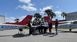 Members of the Ocala Metro Chamber and Economic Partnership joined Epic Flight Academy staff to cut the ribbon on the new flight training facility. Members of the Ocala Metro Chamber and Economic Partnership joined Epic Flight Academy staff to cut the ribbon on the new flight training facility.