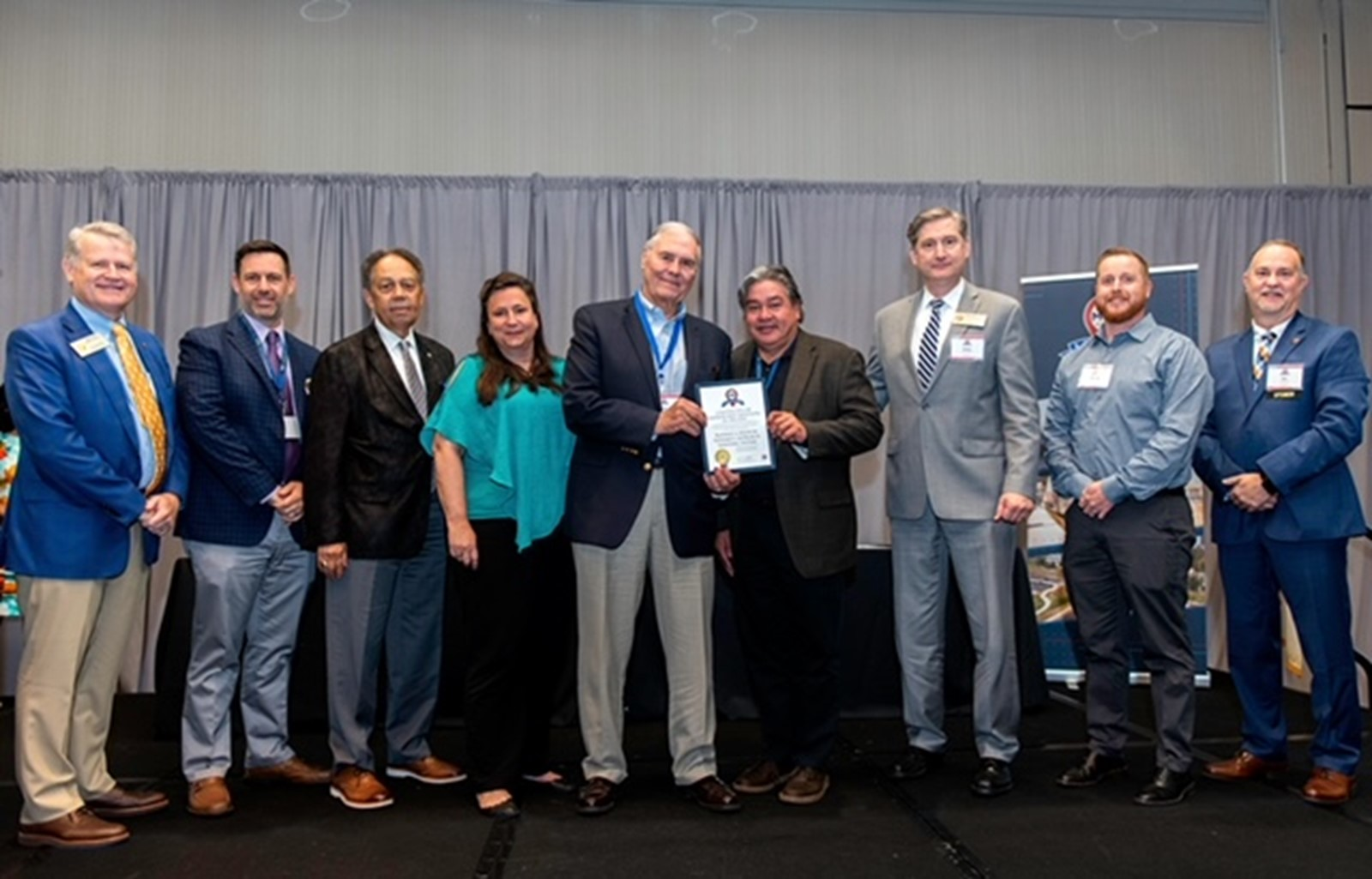 Pictured from left to right: Michael Fox, Chairman, NC Board of Transportation; Matt Jones, NCDOT Division 9 Deputy Traffic Engineer; Andrew Perkins, Vice Chairman, NC Board of Transportation; Rachel Bingham, NCDOT Division of Aviation Deputy Director/Manager of Aviation Development; Rick Phillips, Chairman of the Davidson County Airport Karel Van Der Linden, Airport Manager, Davidson County Airport ; Bobby Walston, NCDOT Division of Aviation Director; Michael Player, Project Engineer, Talbert, Bright &amp; Ellington J.; Eric Boyette, NCDOT Secretary of Transportation.