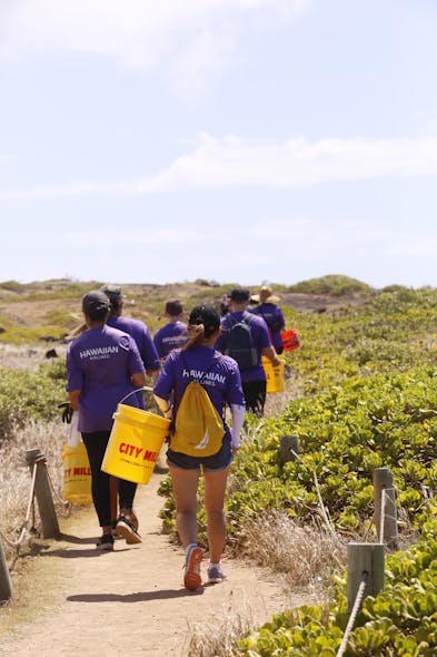Team K&omacr;kua, Hawaiian Airlines&apos; employee volunteer group, at a clean-up event at Oʻahu&apos;s Kaʻena Point State Park.