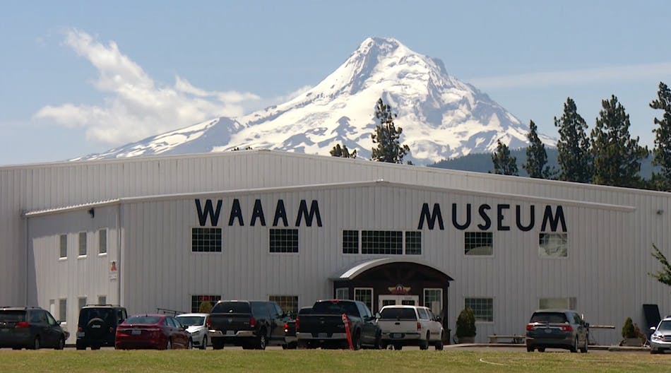 Majestic Mount Hood overlooks the Western Antique Aeroplane &amp; Automobile Museum (WAAAM) at Hood River, Ore., where thousands of people come each year to see many one-of-a-kind antique vehicles and aircraft.