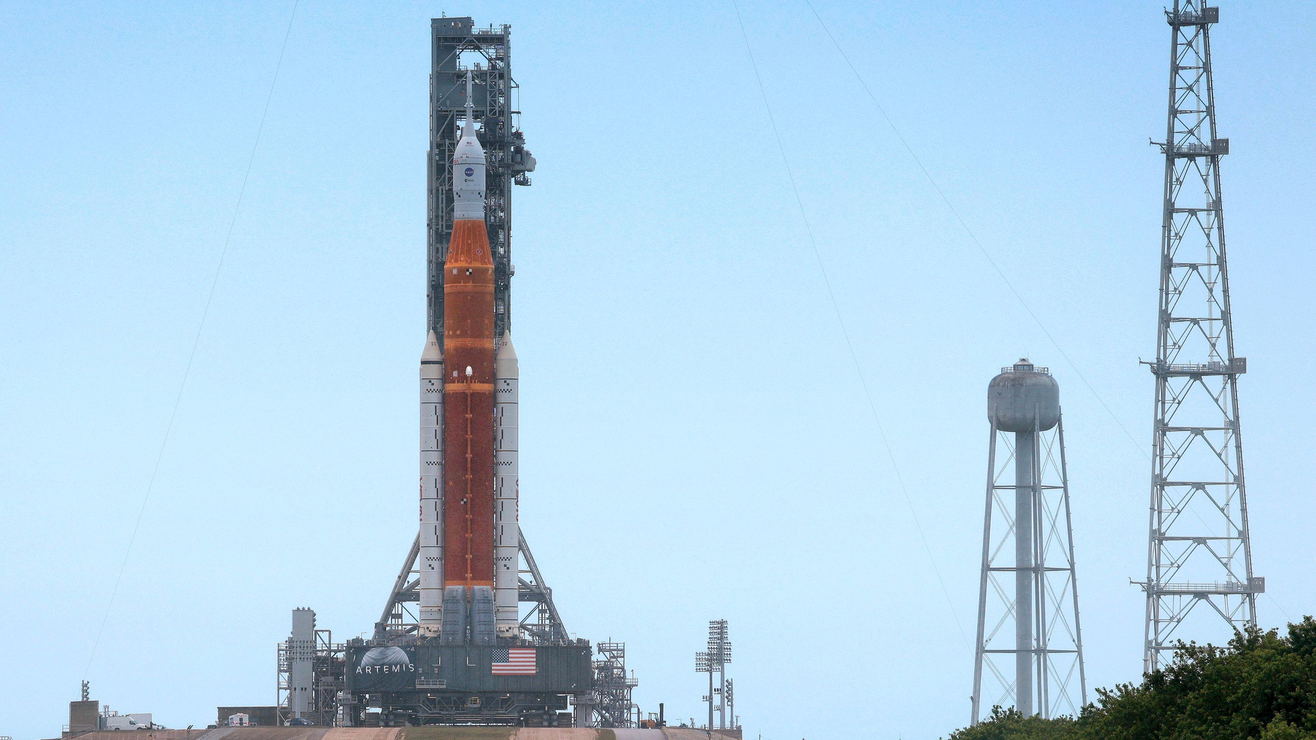 After completing its second rollout overnight Sunday, Artemis 1 the NASA moonshot rocket system stands at launch pad 39-B at Kennedy Space Center, Fla., Monday, June 6, 2022. The 322-foot-tall rocket stack includes the Orion spacecraft and traveled the 4.4-mile journey from the Vehicle Assembly Building to the pad for a planned wet dress rehearsal June 19.