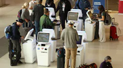 Delta Airlines customers check in for flights at San Francisco International Airport on May 12, 2022, in San Francisco, California.