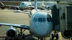 American Eagle planes are seen parked at DFW International Airport terminal B in March.