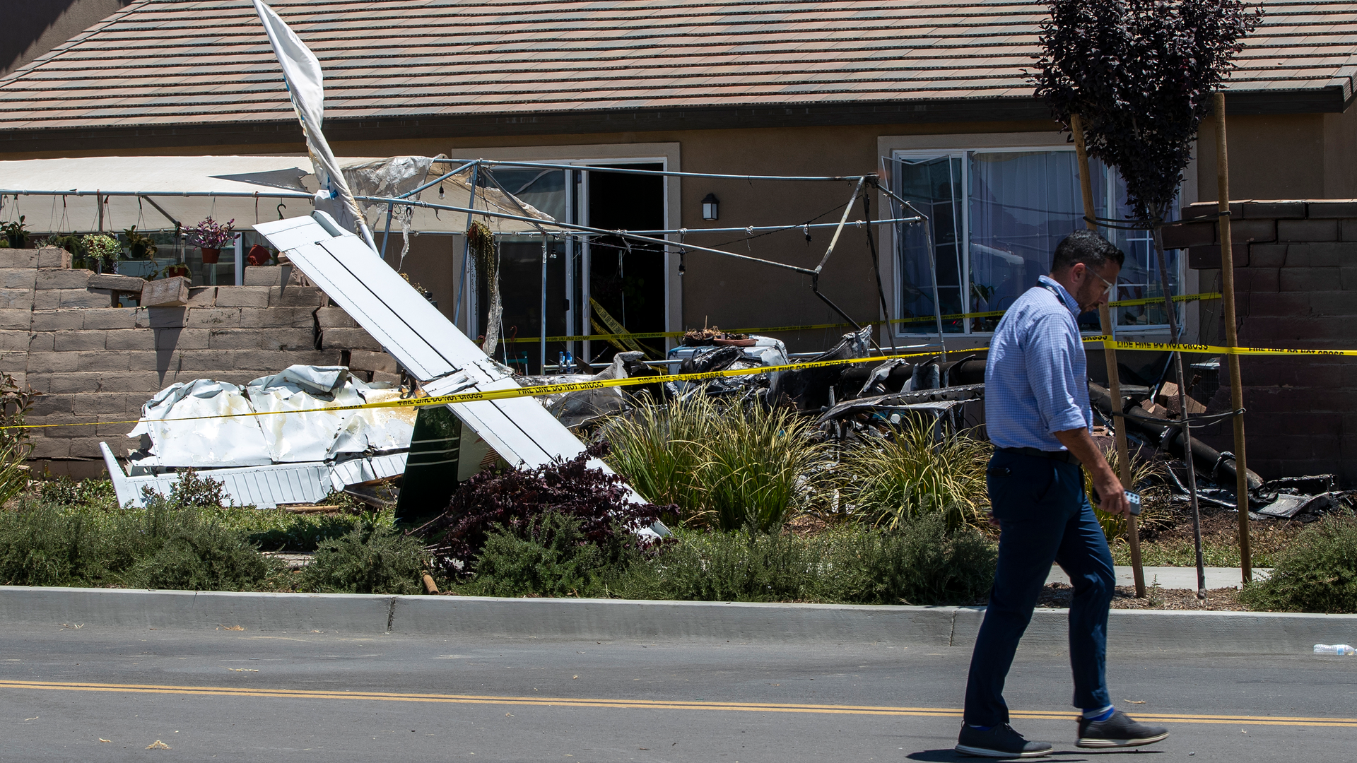 A small plane crashed through a brick wall in the backyard of a home, seriously injuring the pilot, off Warner Road on Tuesday, June 7, 2022, in Hemet, California. The crash occurred just over a mile from south of Hemet-Ryan Airport.