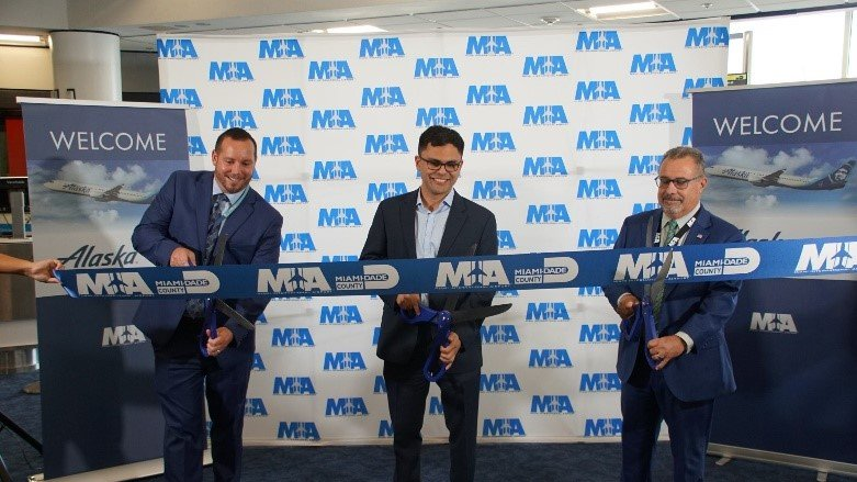 Ribbon-cutting ceremony. From left: Thomas McMahon, Director of Airport Operations, Alaska Airlines; David Asher, Senior Network Analyst, Alaska Airlines; and, Dan Agostino, Assistant Director of Operations, Miami-Dade Aviation Department