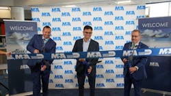 Ribbon-cutting ceremony. From left: Thomas McMahon, Director of Airport Operations, Alaska Airlines; David Asher, Senior Network Analyst, Alaska Airlines; and, Dan Agostino, Assistant Director of Operations, Miami-Dade Aviation Department Ribbon-cutting ceremony. From left: Thomas McMahon, Director of Airport Operations, Alaska Airlines; David Asher, Senior Network Analyst, Alaska Airlines; and, Dan Agostino, Assistant Director of Operations, Miami-Dade Aviation Department