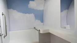 The interior of a lactation pod in Terminal 2 at Chicago O'Hare International Airport. The private pods are free to use and include seating, electrical outlets and a mirror.