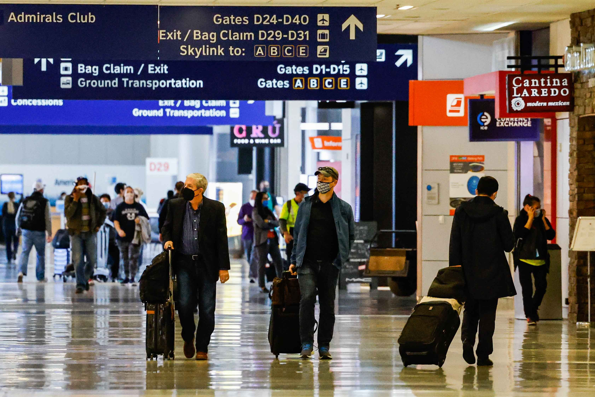 Passengers in Terminal D at DFW Airport on Tuesday, March 1, 2022.