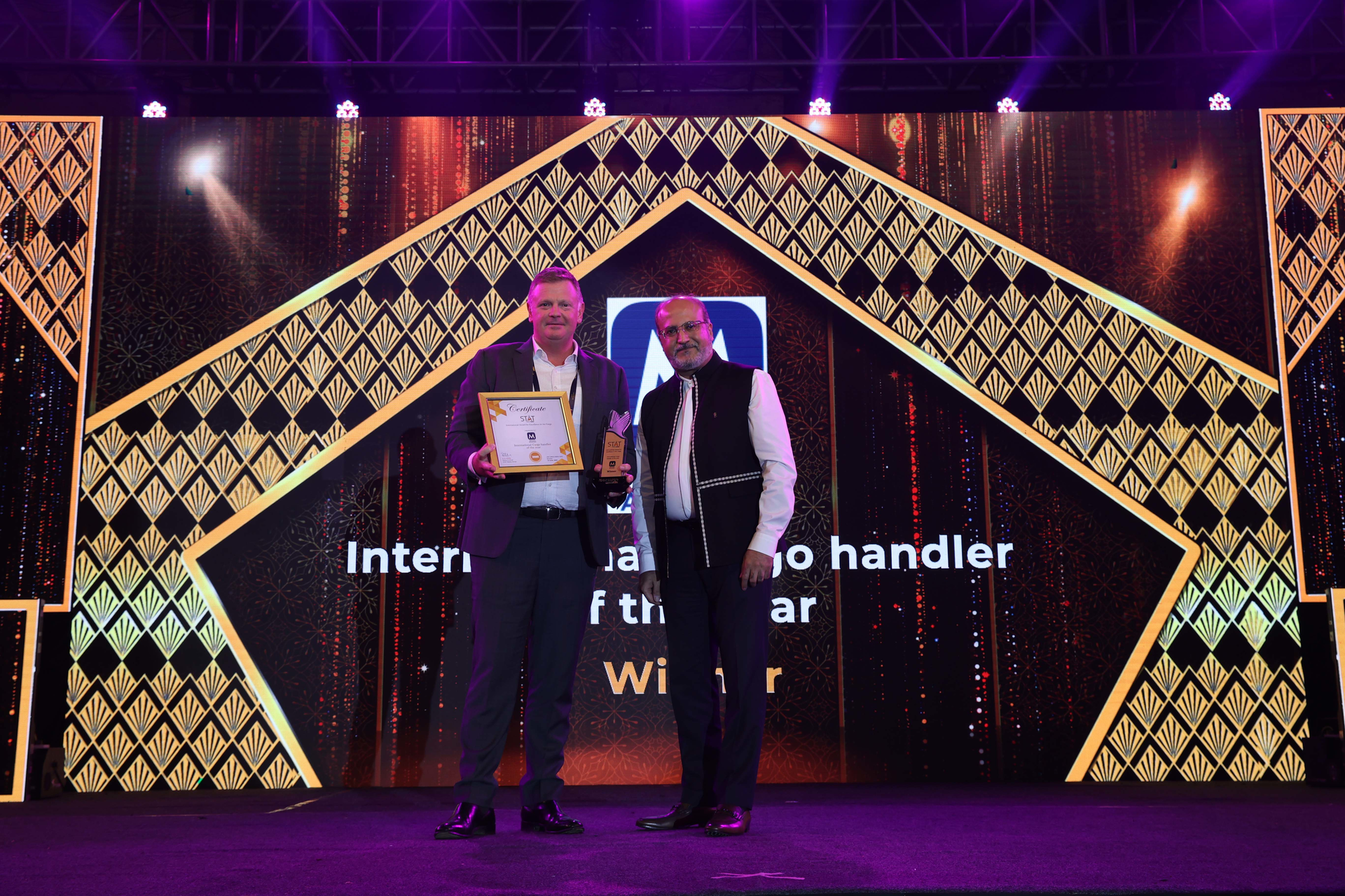 Charles Wyley, EVP - Middle East, Africa, Asia, accepts the International Air Cargo Handler of the Year award on behalf of Menzies Aviation