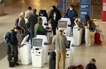 Delta Airlines customers check in for flights at San Francisco International Airport on May 12, 2022, in San Francisco, California.