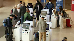 Delta Airlines customers check in for flights at San Francisco International Airport on May 12, 2022, in San Francisco, California.