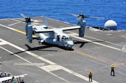 Aviation boatswain's mates chock and chain an MV-22B Osprey in an August 2014 file image. Aviation boatswain's mates chock and chain an MV-22B Osprey in an August 2014 file image.