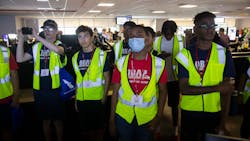 Students toured the American Airlines Hub Control Center during the Organization of Black Aerospace Professionals aerospace career summer camp Wednesday at DFW International Airport. Students toured the American Airlines Hub Control Center during the Organization of Black Aerospace Professionals aerospace career summer camp Wednesday at DFW International Airport.