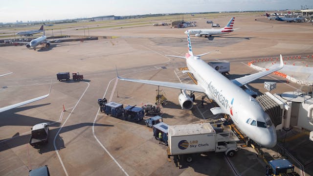 An American Airlines flight sits at terminal C30 at Dallas/Fort Worth International Airport on Friday, July 1, 2022, in DFW Airport, TX. Today is set to be the busiest travel day of the summer of 2022.