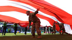 Members of the U.S. military hold an American flag during the Opening Ceremony on day one of the World Athletics Championships Oregon22 at Hayward Field on July 15, 2022, in Eugene, Oregon.