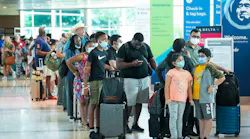 Passengers in line to check in for a flight at Dallas Love Field Airport on Monday, July 25, 2022. A ground stop was ordered for flights at Love Field airport after Dallas police shot a woman who fired several shots inside the terminal, police said, with flights resuming hours later.