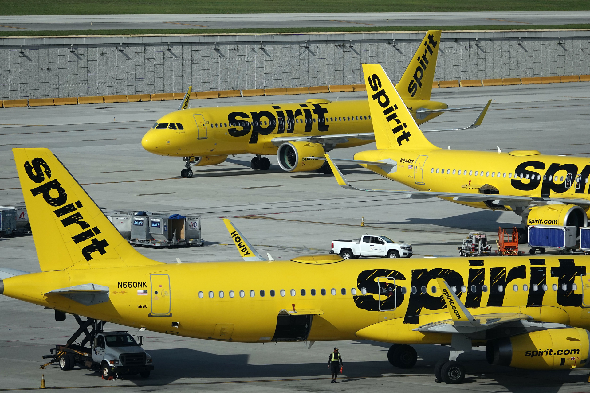 Spirit Airlines jetliners are shown at Fort Lauderdale-Hollywood International Airport in late June. The airline's shareholders voted against an offer from Denver-based Frontier Airlines, which opens the door for a possible takeover from JetBlue Airways.