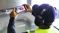 Air bp’s Airfield Automation app - scanning a customer’s decal. Air bp’s Airfield Automation app - scanning a customer’s decal.