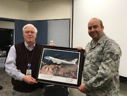Al Stuart shows a presentation made to him by the crew of Air Force One in recognition of SLC Airport Operation’s support. Al Stuart shows a presentation made to him by the crew of Air Force One in recognition of SLC Airport Operation’s support.