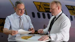 AlbaStar CEO Michael Harrington and WheelTug CEO Isaiah Cox signing the agreement. AlbaStar CEO Michael Harrington and WheelTug CEO Isaiah Cox signing the agreement.