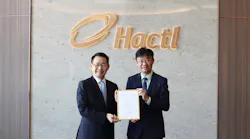 Hactl Chief Executive Wilson Kwong (left) receives a certificate of commendation from Steve Lai, General Manager of Qualifications Framework Secretariat, confirming recognition of four Hactl training courses under the Hong Kong Qualifications Framework.