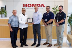 Ryan McCartney (third from the left), vice president and COO, Hillsboro Aviation, receives the Authorized Service Center plaque from Amod Kelkar (second from the left), head of the commercial business unit and vice president, customer service for Honda Aircraft Company. Ryan McCartney (third from the left), vice president and COO, Hillsboro Aviation, receives the Authorized Service Center plaque from Amod Kelkar (second from the left), head of the commercial business unit and vice president, customer service for Honda Aircraft Company.