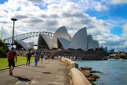 People walk along the waterfront of Sydney Harbor in Sydney, Australia, on Feb. 26, 2017. In the background is the iconic Sydney Opera House. People walk along the waterfront of Sydney Harbor in Sydney, Australia, on Feb. 26, 2017. In the background is the iconic Sydney Opera House.