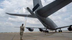 Airman 1st Class Jacob Helzer, 100th Maintenance Squadron hydraulics maintenance journeyman, uses the Boom Cover Tool on a KC-135 Stratotanker aircraft at RAF Mildenhall, United Kingdom, July 22, 2022. The Boom Cover Tool, created by Helzer, is expected to save 40,000 man-hours and $1 million annually. Airman 1st Class Jacob Helzer, 100th Maintenance Squadron hydraulics maintenance journeyman, uses the Boom Cover Tool on a KC-135 Stratotanker aircraft at RAF Mildenhall, United Kingdom, July 22, 2022. The Boom Cover Tool, created by Helzer, is expected to save 40,000 man-hours and $1 million annually.
