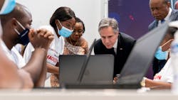 U.S. Secretary of State Antony Blinken, second from right, visits an election transparency hackathon event at the Kinshasa Digital Academy in Kinshasa, Congo, on Wednesday, Aug. 10, 2022.