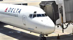 A Delta Airlines flight gated at Atlanta Hartsfield-Jackson International Airport.