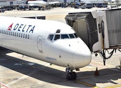 A Delta Airlines flight gated at Atlanta Hartsfield-Jackson International Airport.