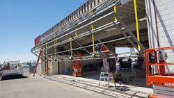 Arizona Corporate Builders revamped the Chandler Aviation building and installed the 48-foot bifold door. They have installed other Schweiss doors including an 86-foot by 26-foot door on the new Triple C hangar in Scottsdale, Ariz. Arizona Corporate Builders revamped the Chandler Aviation building and installed the 48-foot bifold door. They have installed other Schweiss doors including an 86-foot by 26-foot door on the new Triple C hangar in Scottsdale, Ariz.