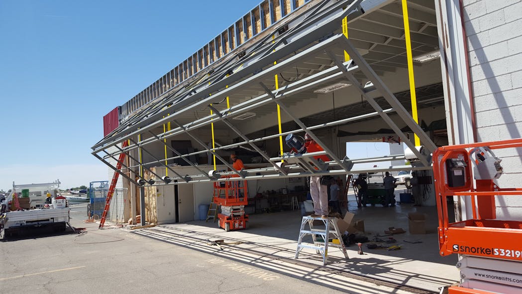 Arizona Corporate Builders revamped the Chandler Aviation building and installed the 48-foot bifold door. They have installed other Schweiss doors including an 86-foot by 26-foot door on the new Triple C hangar in Scottsdale, Ariz.