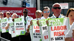 September 1, 2022 Atlanta - Delta pilots conduct informational picketing at the south terminal at Hartsfield-Jackson Atlanta International Airport ahead of the busy Labor Day travel weekend as they push for a new labor contract on Thursday, September 1, 2022.