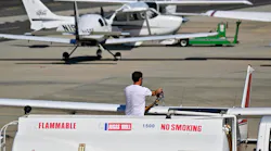 A worker fills a Cessna 172 with 100 low lead aviation gas at Long Beach Airport in Long Beach, CA, on Monday, September 12, 2022. Small planes are the largest source of airborne lead emissions in the United States.