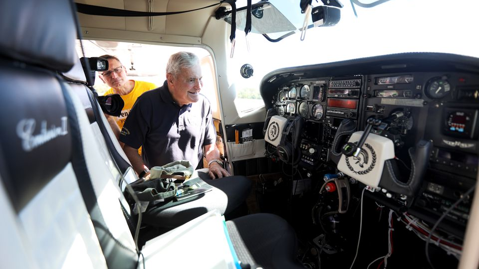 Ed Galkin, 86, checks the inside of his plane which he will be flying around the world for a 4th time starting Sunday, along with co-captain Zvi Mosery, from the Central Jersey Regional Airport in Hillsborough, N.J., Wednesday, September 14, 2022.