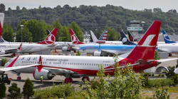A Shanghai Airlines Boeing 737 MAX parked among other grounded MAXs across from Boeing Field in Seattle in June 2020.