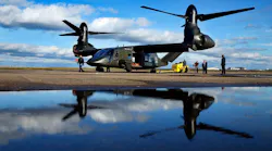 The V-280 Valor tilt-rotor, a next-generation aircraft that Bell wants to build for the U.S. military, was reflected in rain water after demonstrating its skills at the Bell Flight Research Center in Arlington.