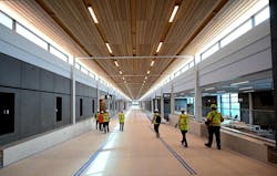 Construction on the new Kansas City International Airport continues and is about 90% complete. The airport is slated to open in March 2023 and feature 39 gates. Hemlock planks line the ceiling inside much of the facility, including concourse B. The project will also include a 6,300-space parking structure along landside and airside improvements. Construction on the new Kansas City International Airport continues and is about 90% complete. The airport is slated to open in March 2023 and feature 39 gates. Hemlock planks line the ceiling inside much of the facility, including concourse B. The project will also include a 6,300-space parking structure along landside and airside improvements.