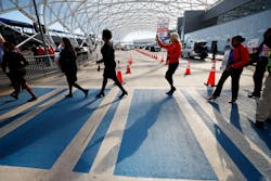 A group of Southwest flight attendants crosses the path to reach the median sidewalk to protest outside the North Terminal at Hartsfield-Jackson Atlanta International Airport on Tuesday, September 27, 2022. The Atlanta group joined Southwest Airlines flight attendants at 11 bases across the country to demand change for their workgroup. A group of Southwest flight attendants crosses the path to reach the median sidewalk to protest outside the North Terminal at Hartsfield-Jackson Atlanta International Airport on Tuesday, September 27, 2022. The Atlanta group joined Southwest Airlines flight attendants at 11 bases across the country to demand change for their workgroup.
