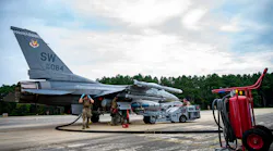 Airmen assigned to Shaw Air Force Base and Joint Base Charleston, S.C., perform an integrated combat turn using an F-16 Fighting Falcon during exercise Iron Hand 22-09 at North Auxiliary Airfield, S.C., Aug. 23, 2022. The integrated combat turn is one of many concepts during Iron Hand 22-09 that were implemented with the ability to generate out of areas with unknown levels of capacity, infrastructure and support while being operationally variable.