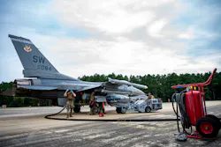 Airmen assigned to Shaw Air Force Base and Joint Base Charleston, S.C., perform an integrated combat turn using an F-16 Fighting Falcon during exercise Iron Hand 22-09 at North Auxiliary Airfield, S.C., Aug. 23, 2022. The integrated combat turn is one of many concepts during Iron Hand 22-09 that were implemented with the ability to generate out of areas with unknown levels of capacity, infrastructure and support while being operationally variable.