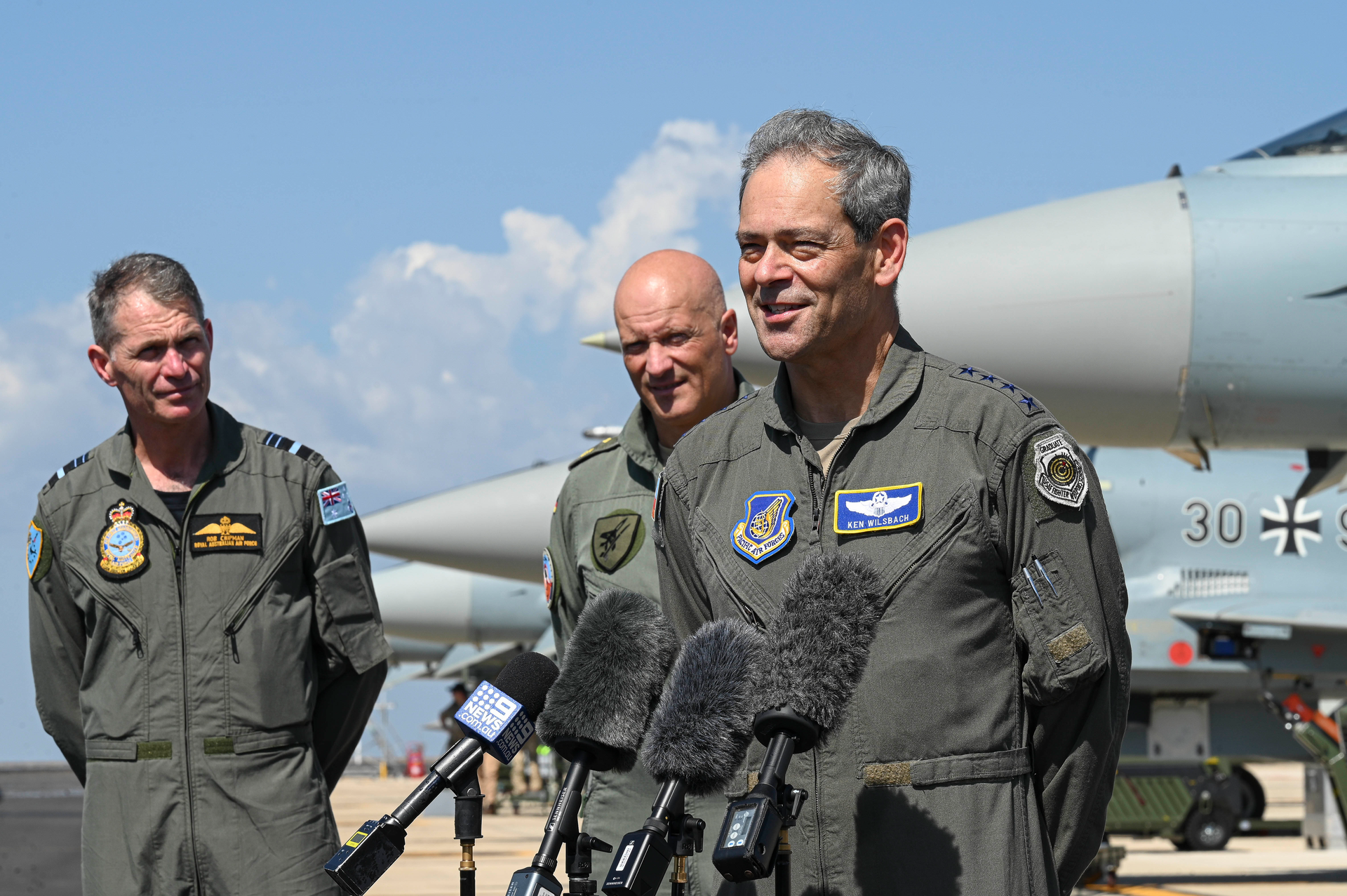 Royal Australian Air Force Air Marshal Robert Chipman, chief of the Royal Australian Air Force, and German Air Force Lt. Gen. Ingo Gerhartz, chief of the German Air Force; look on as U.S. Air Force Gen. Ken Wilsbach, Pacific Air Forces commander, speaks with members of the local media during a visit to Royal Australian Air Force Base Darwin, Australia, Sept. 5, 2022. Leadership spoke on exercise Pitch Black 2022 interoperability opportunities and expressed the importance of allies and partners working together to ensure a free and open Indo-Pacific.
