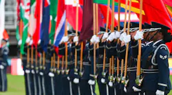 The United States Air Force Honor Guard parades the country flags representing the international air chiefs in attendance at the Air Force 75th Anniversary Tattoo Sept. 15, 2022, at Audi Field, Washington, D.C. The parading of the flags symbolizes the unity and collective power the U.S. has built with its international partners and allies. This display was a part of the celebration of the Air Force’s 75th year.