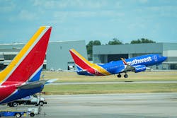 A Southwest Airlines plane takes off at Dallas Love Field Airport on July 25, 2022.