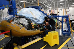 Sierra Space employees work on one of two Dream Chasers currently in production at Sierra Space on September 19, 2022 in Louisville, Colorado. Sierra has doubled its workforce, from 1000 to 2,000, over the past year. Its centerpiece effort right now is the Dream Chaser, which harks back to the space shuttle design. They're expected to launch an un-crewed flight next year to take cargo to the International Space Station. The Dream Chaser will be the first-ever winged commercial spaceplane. It will be capable of gentle 1.5 G runway landings and will be able to accommodate more than 12,000 pounds of supplies and equipment. It will be able to help NASA resupply missions for the International Space Stations. The company hopes to launch its first Dream Chaser mission in 2023. Sierra Space employees work on one of two Dream Chasers currently in production at Sierra Space on September 19, 2022 in Louisville, Colorado. Sierra has doubled its workforce, from 1000 to 2,000, over the past year. Its centerpiece effort right now is the Dream Chaser, which harks back to the space shuttle design. They're expected to launch an un-crewed flight next year to take cargo to the International Space Station. The Dream Chaser will be the first-ever winged commercial spaceplane. It will be capable of gentle 1.5 G runway landings and will be able to accommodate more than 12,000 pounds of supplies and equipment. It will be able to help NASA resupply missions for the International Space Stations. The company hopes to launch its first Dream Chaser mission in 2023.