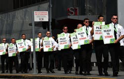 September 1, 2022 Atlanta - Delta pilots conduct informational picketing at the south terminal at Hartsfield-Jackson Atlanta International Airport ahead of the busy Labor Day travel weekend as they push for a new labor contract on Thursday, September 1, 2022. September 1, 2022 Atlanta - Delta pilots conduct informational picketing at the south terminal at Hartsfield-Jackson Atlanta International Airport ahead of the busy Labor Day travel weekend as they push for a new labor contract on Thursday, September 1, 2022.